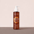 Bottle of Skin Win BrightBoost gel cleanser on a beige background