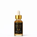 Skincare serum bottle labeled 'Dark Spot Vanisher' on a white background